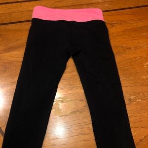 two pairs of cropped workout leggings